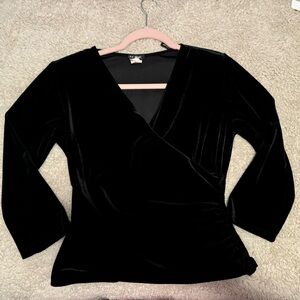 Elegant black velvet blouse with a surplice neckline